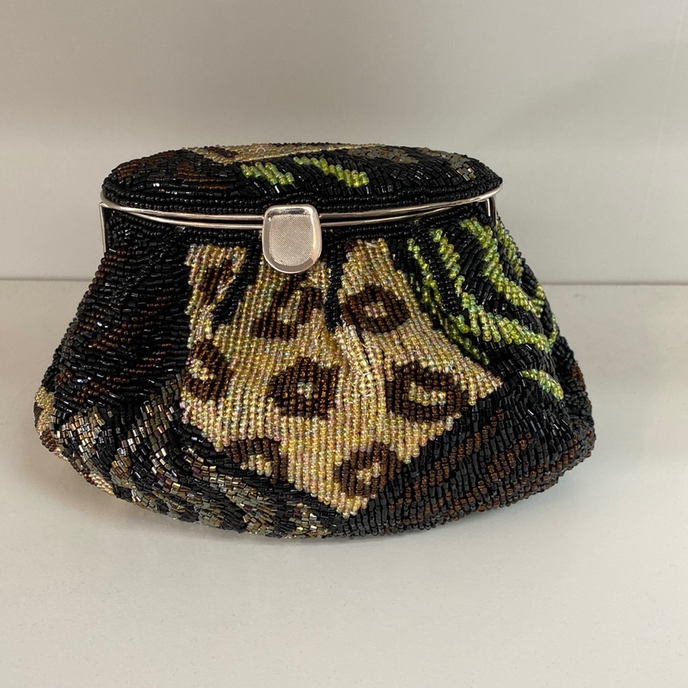 Vintage 90’s beaded animal print clutch/purse.